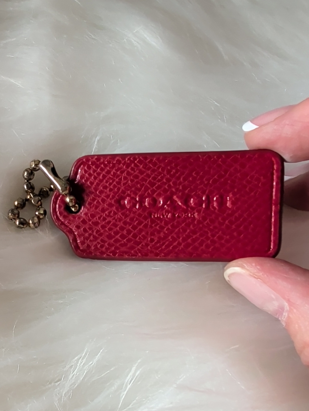 Coach Burgundy Pebbled Leather Tag with Gold Ball Chain